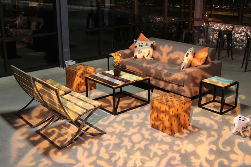 ampaevents_slider-_0017_Industrial-chic-micheal-sofa-barcelona-chair-reclaimed-wood-besto-coffee-table-orange-earth-tones_redskins-training-camp_2048_1200px