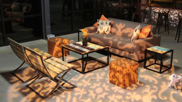 ampaevents_slider-_0017_Industrial-chic-micheal-sofa-barcelona-chair-reclaimed-wood-besto-coffee-table-orange-earth-tones_redskins-training-camp_2048_1200px